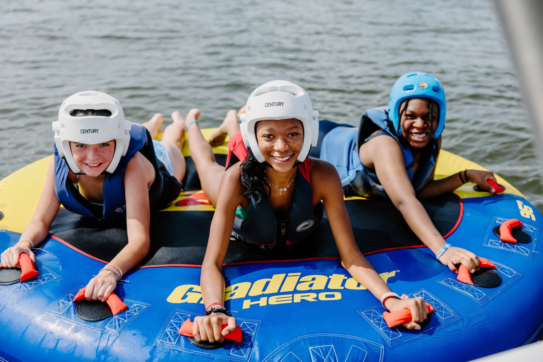 Friends on the tube — all smiles